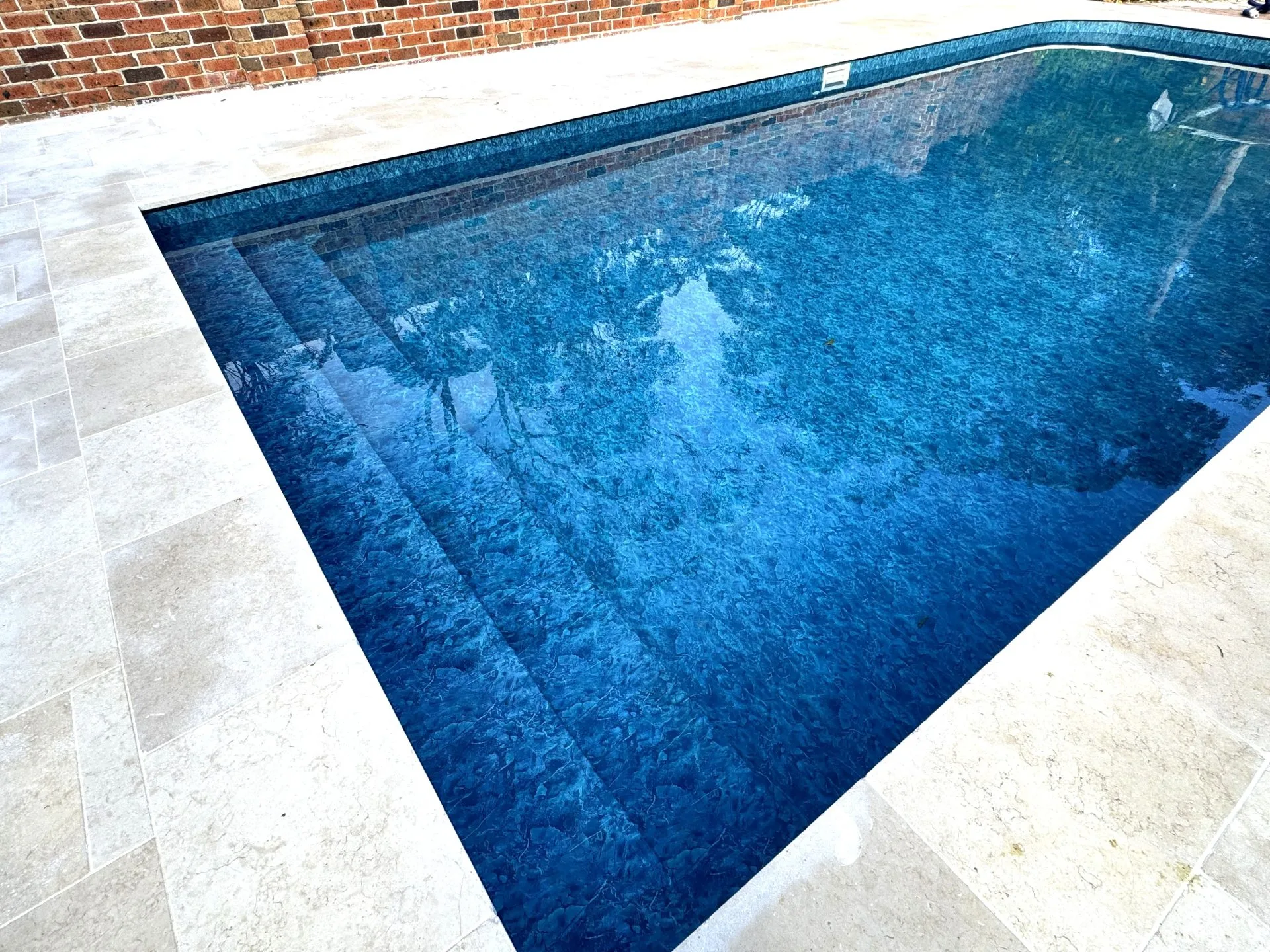 Well maintained blue oasis pool.