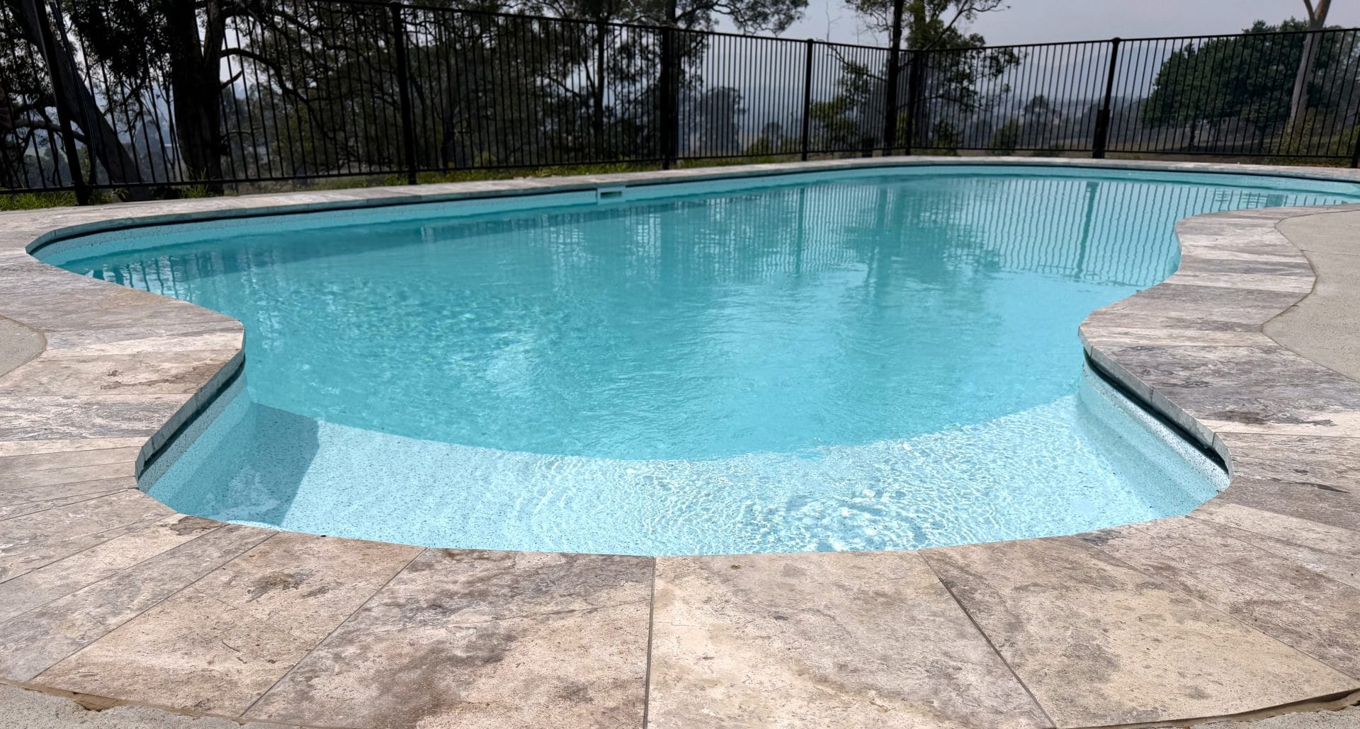 Frank 021 Light coloured vinyl pool liner for bean shaped swimming pool.