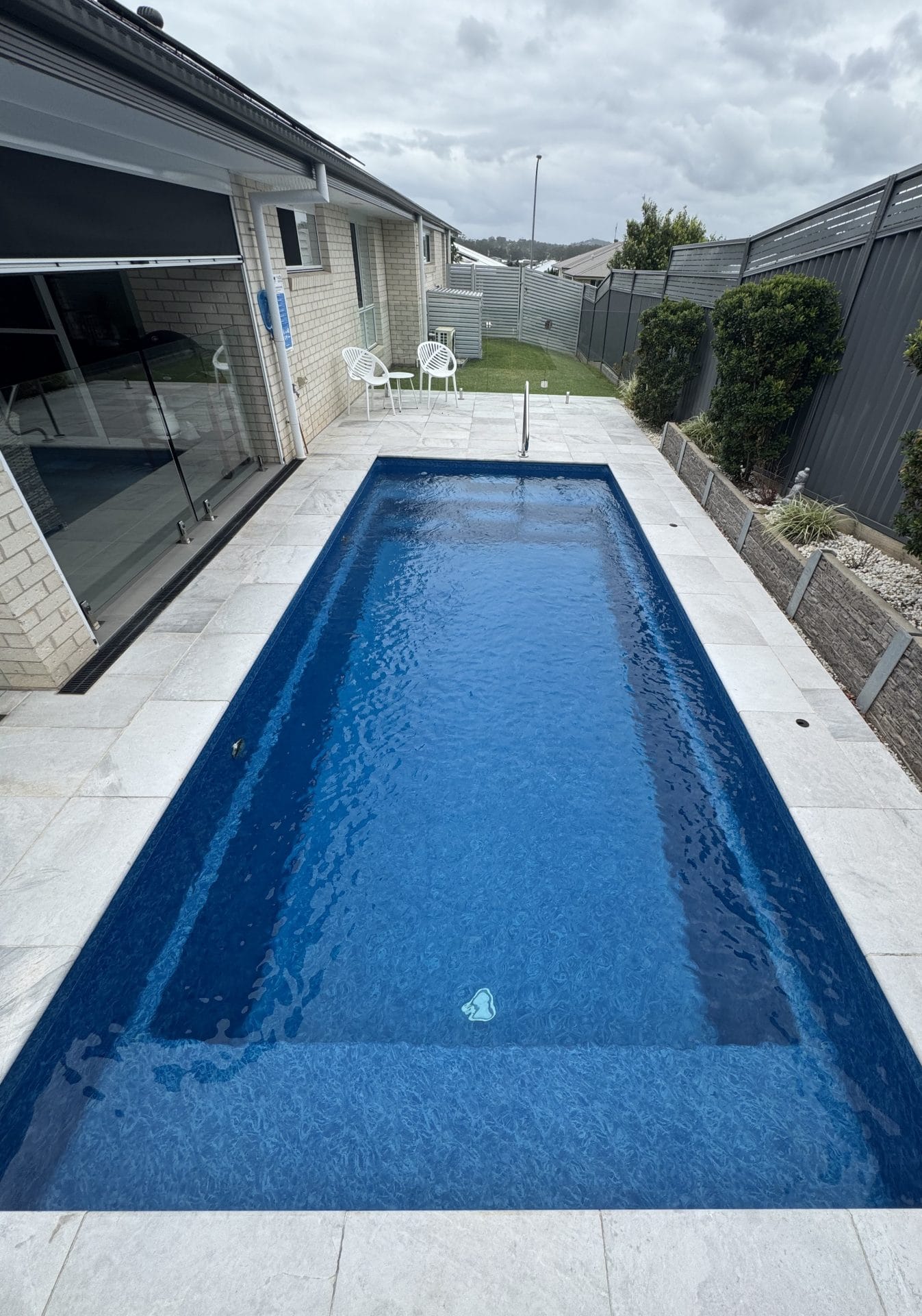 Plunkett After 01 Well maintained blue oasis pool.